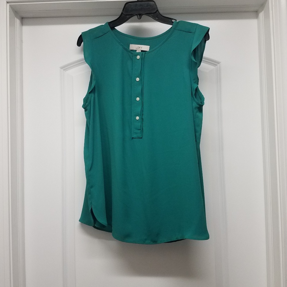 Sleeveless green shirt